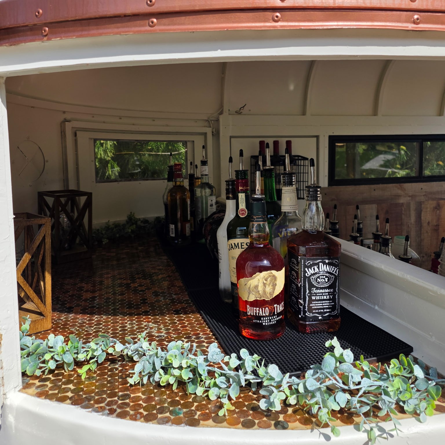 The Lucky Penny mobile bar interior with penny bar top