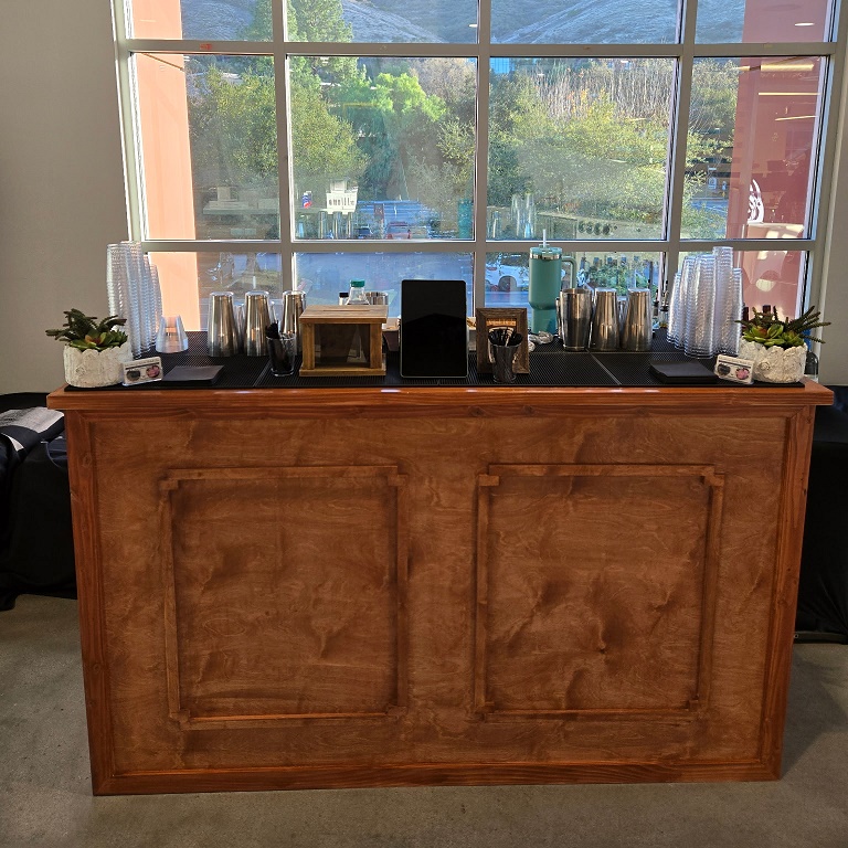 Wandering Spirits' mobile bar rental service featuring a stand alone bar.