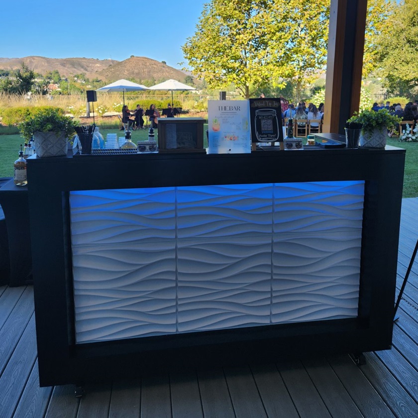Wandering Spirits' mobile bar rental service featuring a stand alone bar.